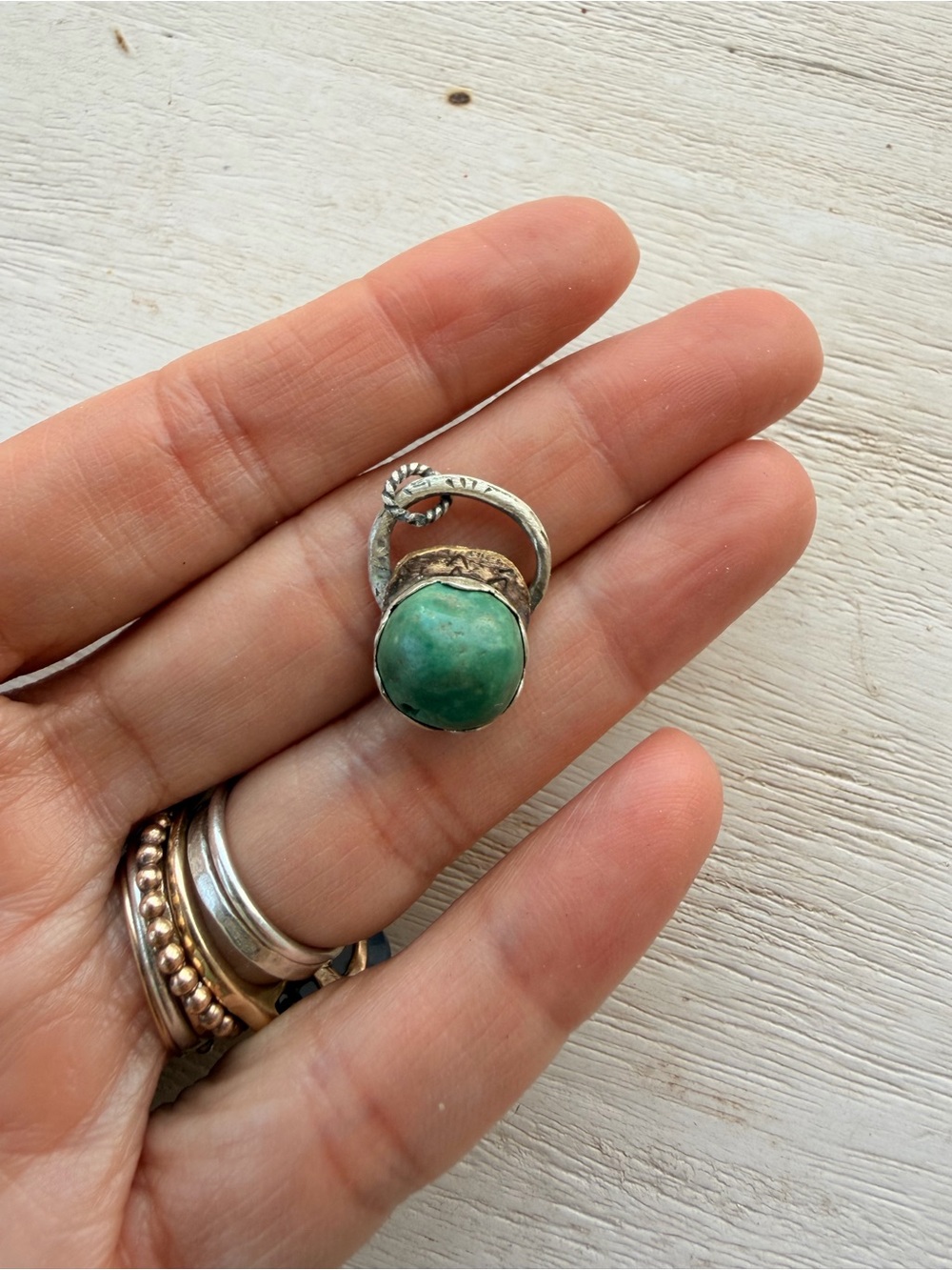 Artisan Turquoise pendant silver and brass.